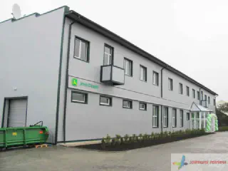 Вивіска компанії Джон дір.