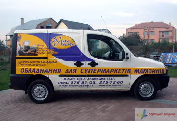 Оформлення рекламою машини, обклейка плівкою.